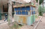 This appears to be an old guard shack or ticket booth located just outside the Afaq Khoja Mausoleum.